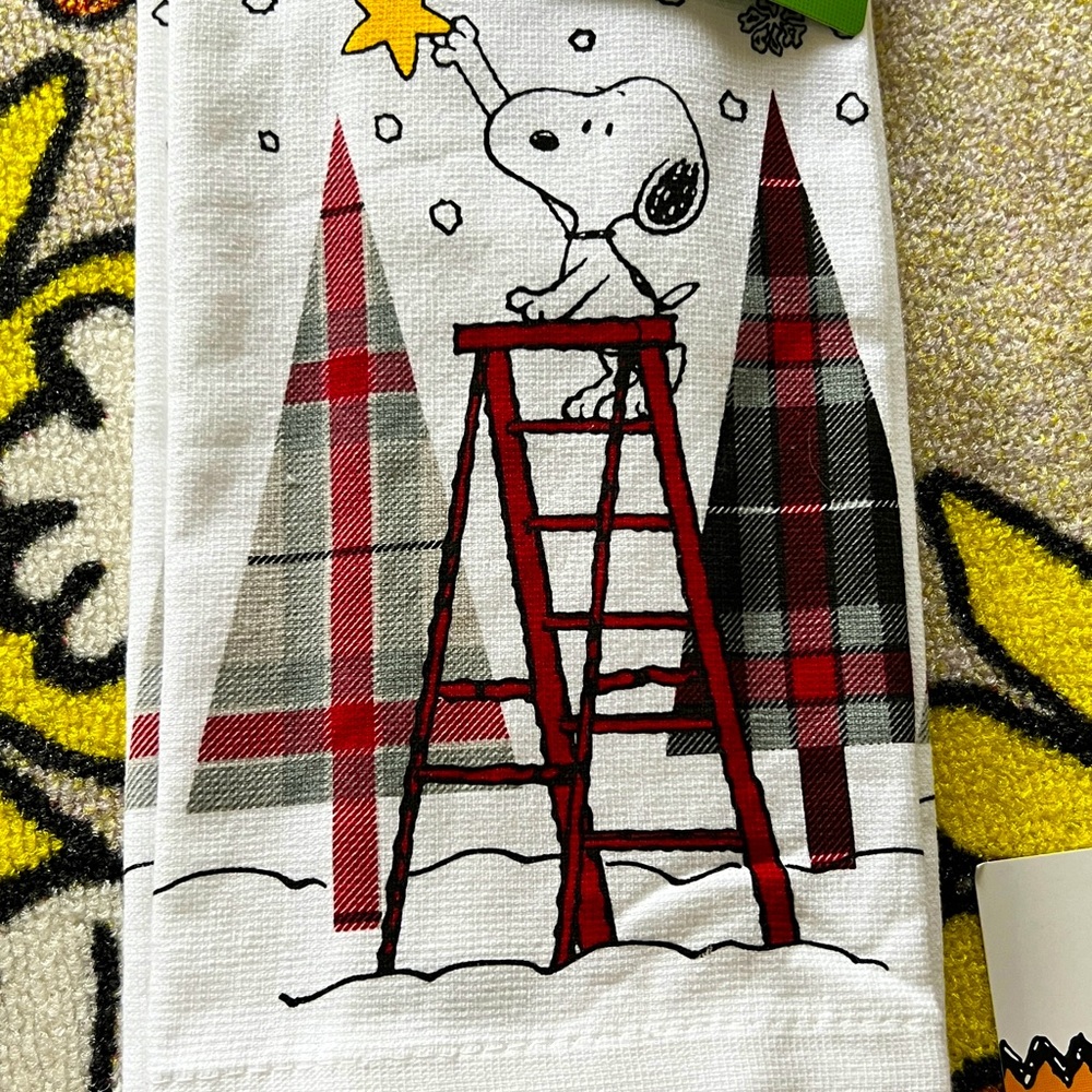 Set of two Peanuts Snoopy Christmas Kitchen Towels. Both are the same pattern.